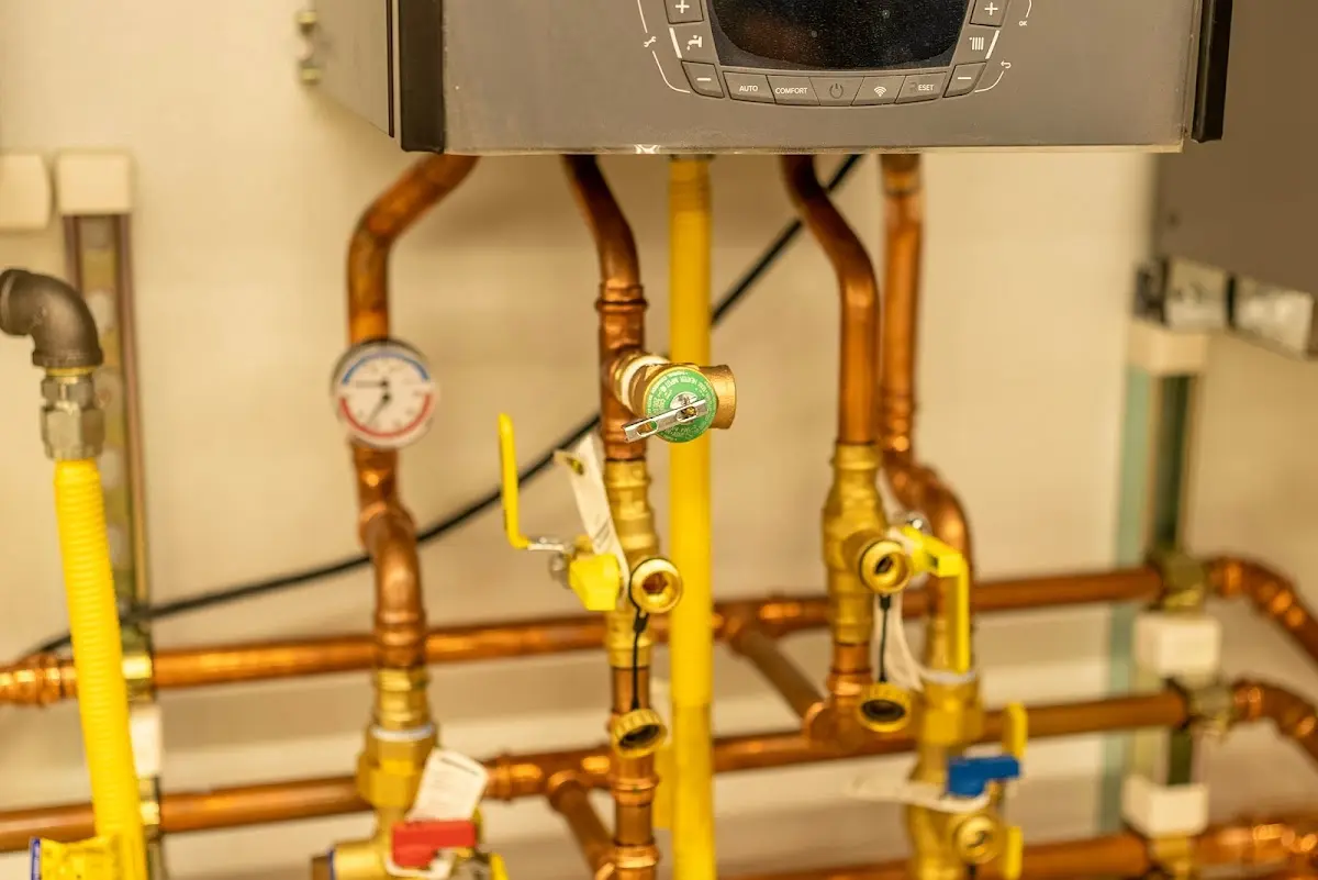 Licensed technician providing Backflow Prevention for a homeowner in Orono